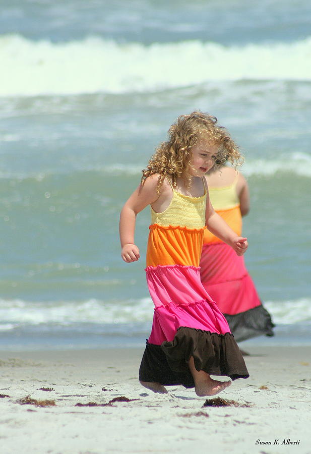 Two girls on beach Photograph by Susan Hawk