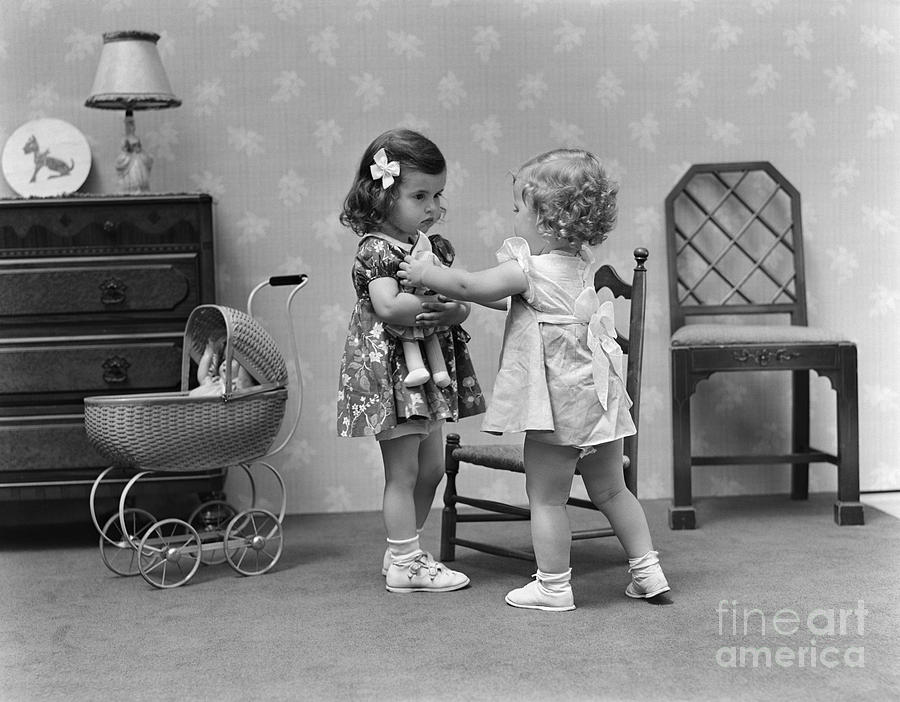 Two Girls Playing With Dolls, C.1940s Photograph by H. Armstrong Roberts/ClassicStock