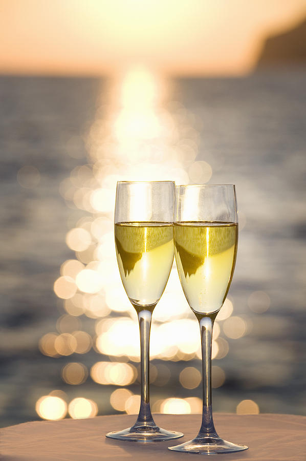 Two Glasses Of Champagne At Sunset Photograph by Bill Holden