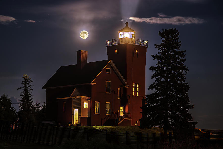 Two Harbors Lighthouse and Moon Photograph by Peter Herman