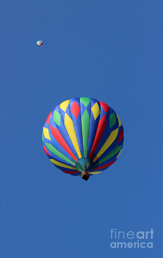 Two Hot Air Balloons Playing Tag Photograph by Karen Adams