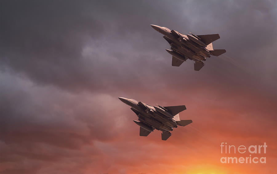 Two low flying F-15E Strike Eagles at sunset Photograph by Simon Bratt