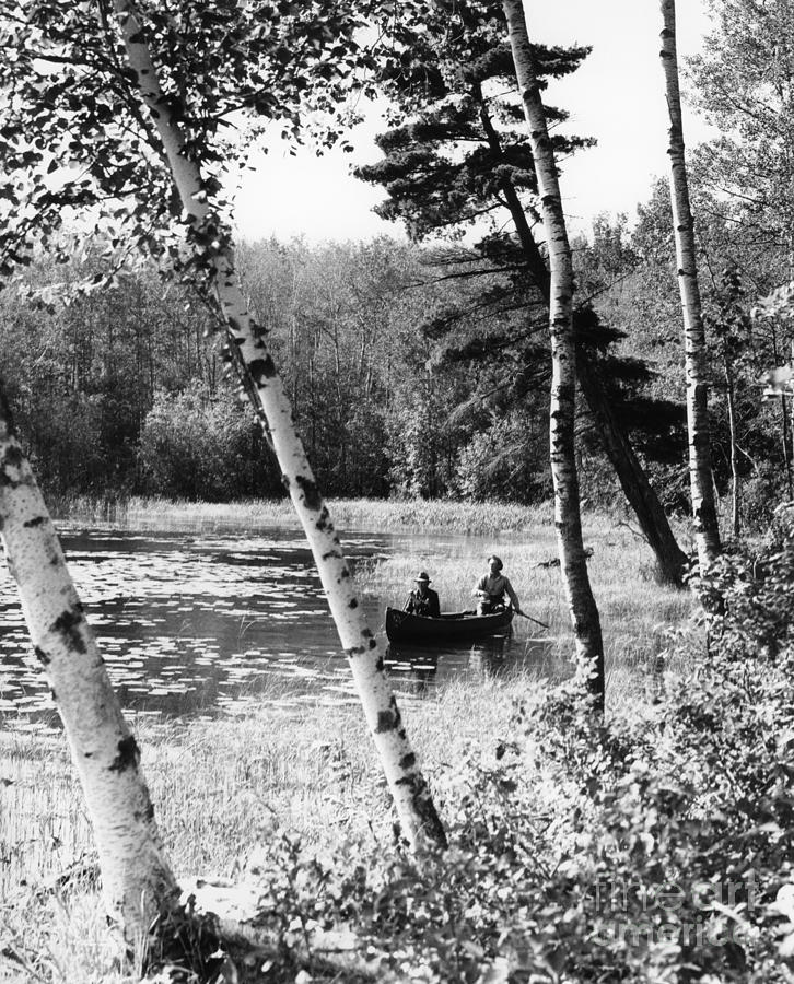 Two Men Canoeing, C.1940s Photograph by H. Armstrong Roberts/ClassicStock