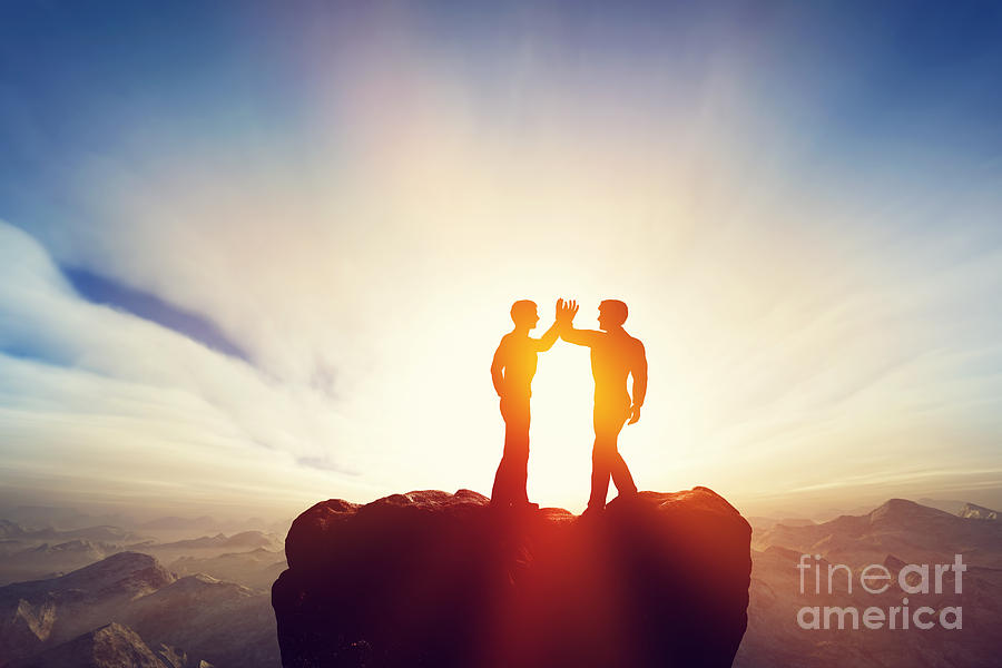 Two men high five on top of the mountains Photograph by Michal Bednarek