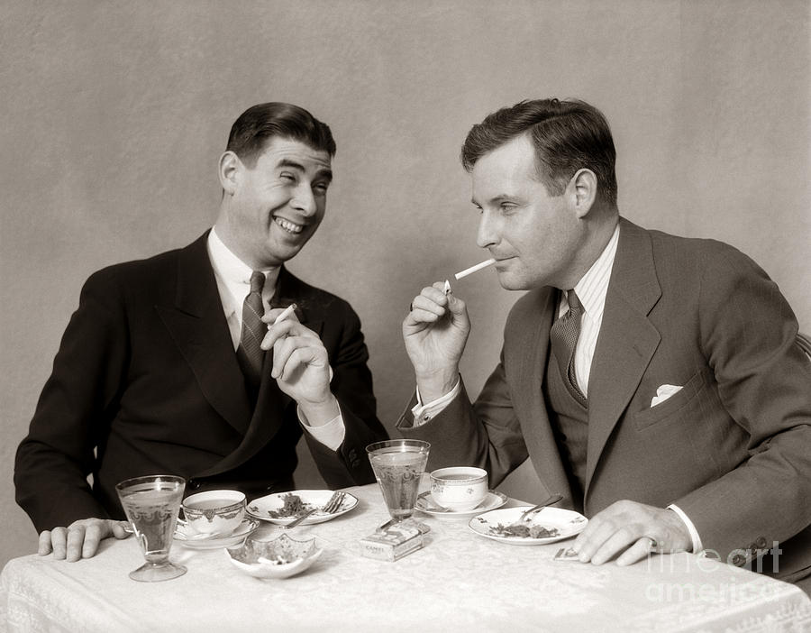 Two Men Lighting After Dinner Photograph by H. Armstrong Roberts/ClassicStock