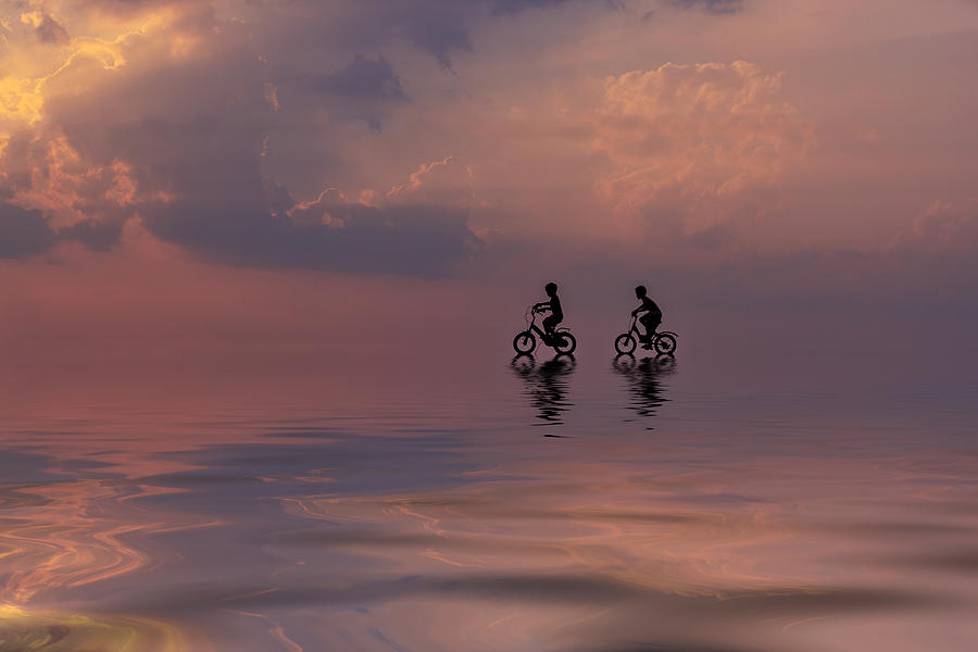 Summer Photograph - Two Mountain Biker Silhouette In Sunrise With Reflection In Water by Jakkree Thampitakkull