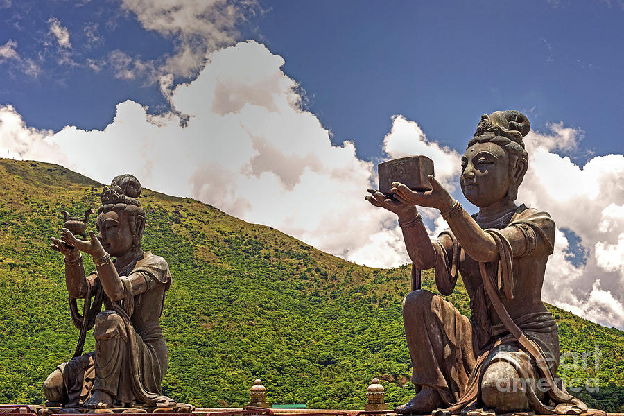 Two Of The Six Devas Give Offerings To The Tian Tan Buddha Photograph