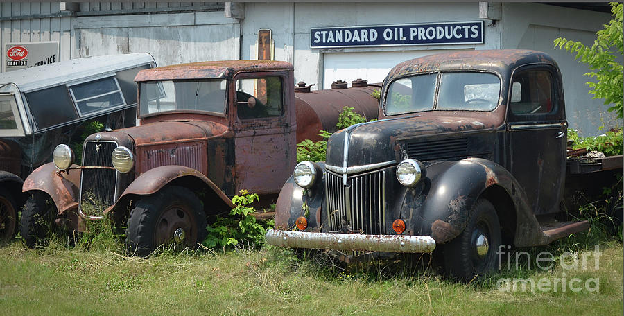 Two Old Ford Trucks Awaiting Restoration Photograph by Ron Long