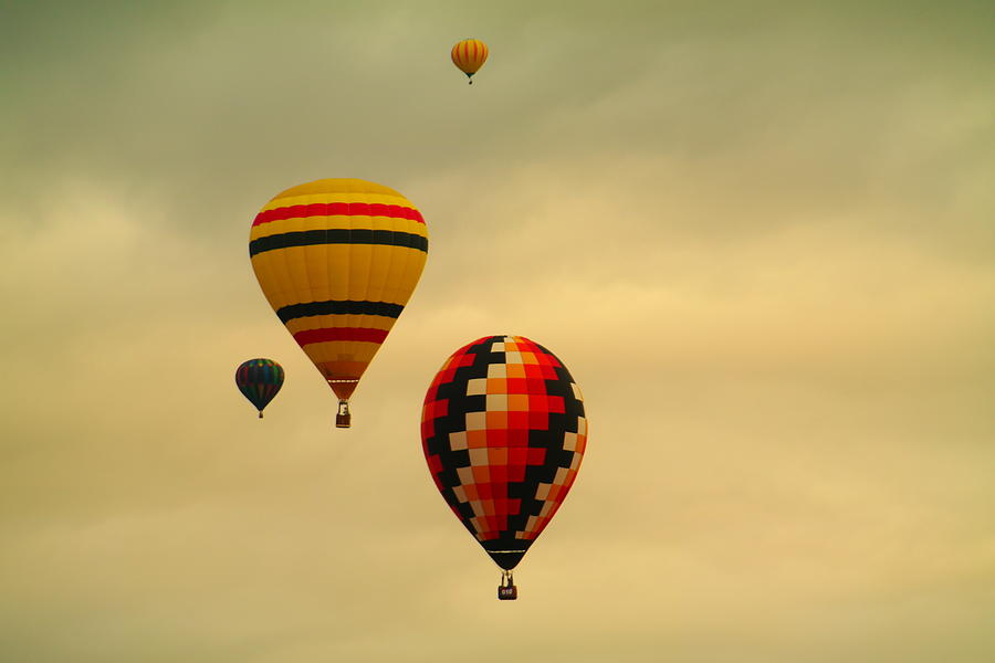 Two racing balloons Photograph by Jeff Swan