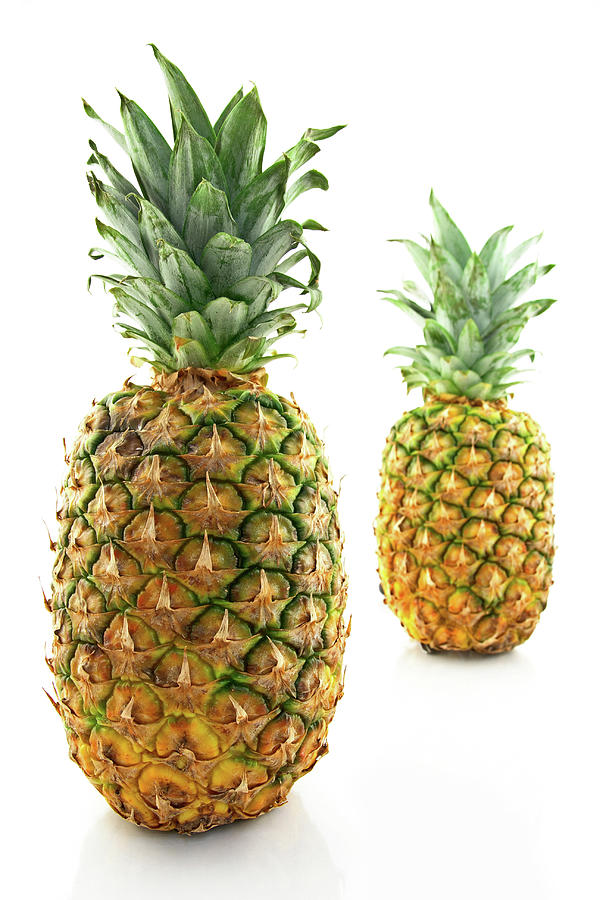 Nature Photograph - Two ripe pineapples, focus on the closest one by GoodMood Art