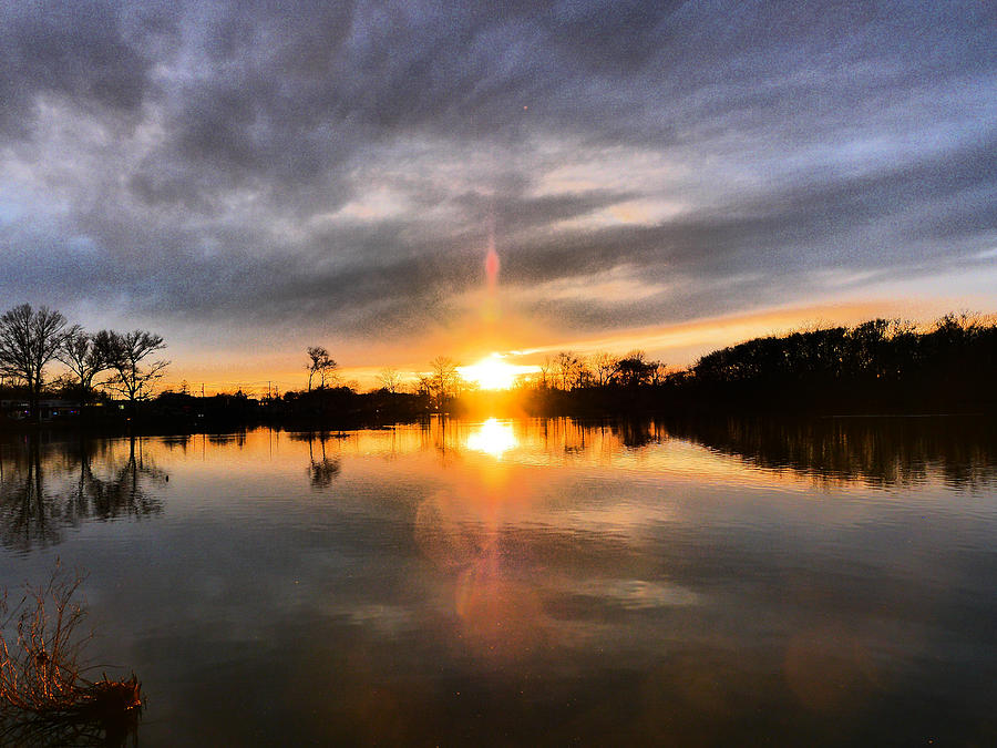 Two Suns on the Pond Photograph by Jack Riordan
