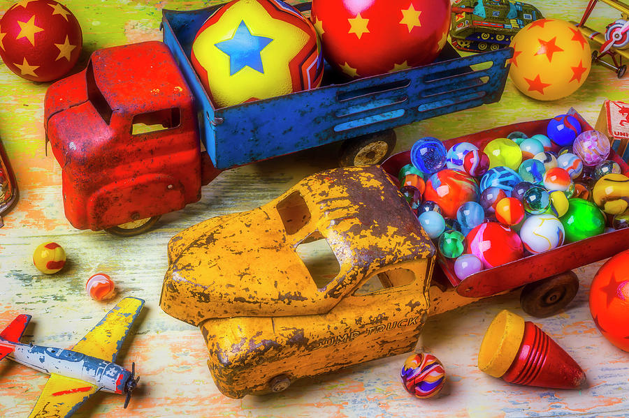 Two toy trucks Photograph by Garry Gay
