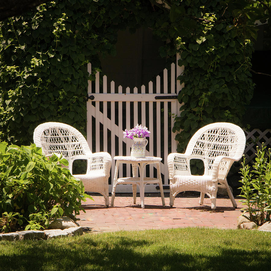 Summer Photograph - Two White Wicker Garden Chairs in the Garden by Robert Anastasi