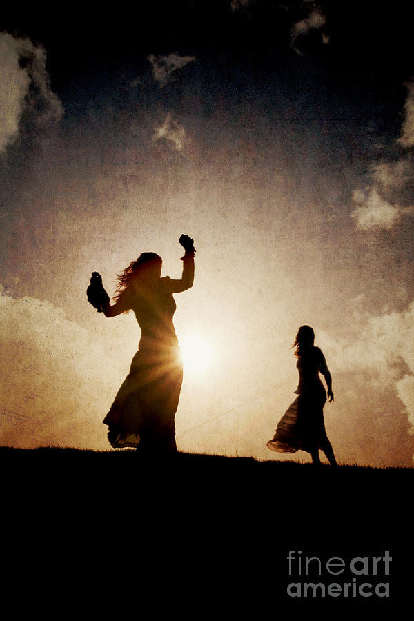 Two women dancing at sunset Photograph by Clayton Bastiani
