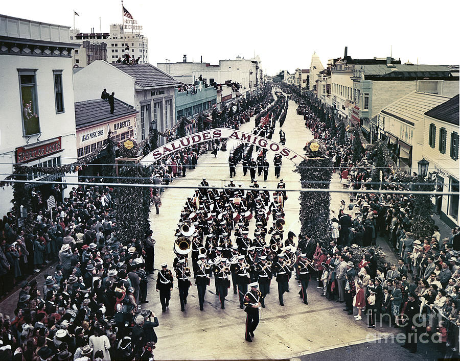Marching Band Photograph - U. S. Marine Corps Marching Band  up Alvarado Street 1949 by Monterey County Historical Society