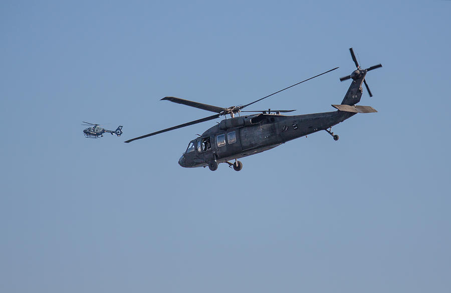 UH-60 blackhawk and Massachusetts State Police Helicopters  Photograph by Brian MacLean