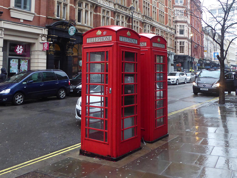 UK Phone Booths Photograph by Margaret Brooks