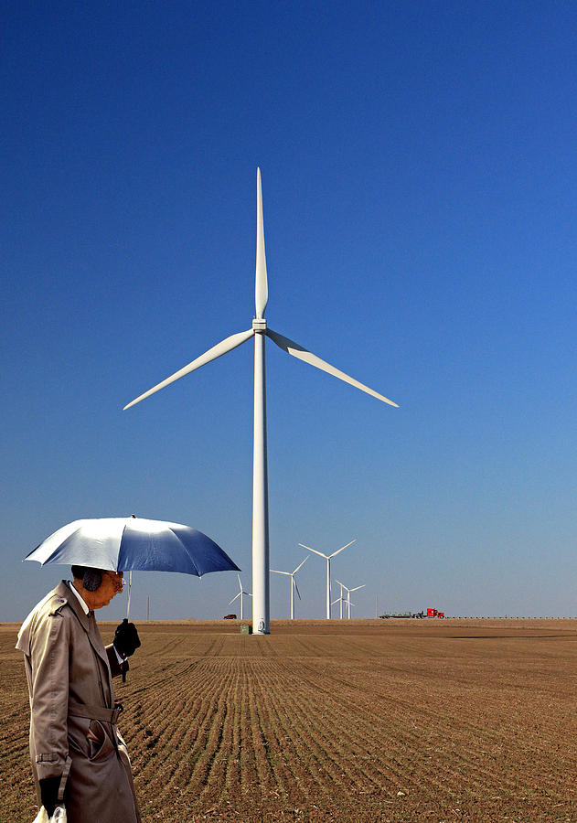 Umbrella Man and Wind Power Photograph by Christopher McKenzie