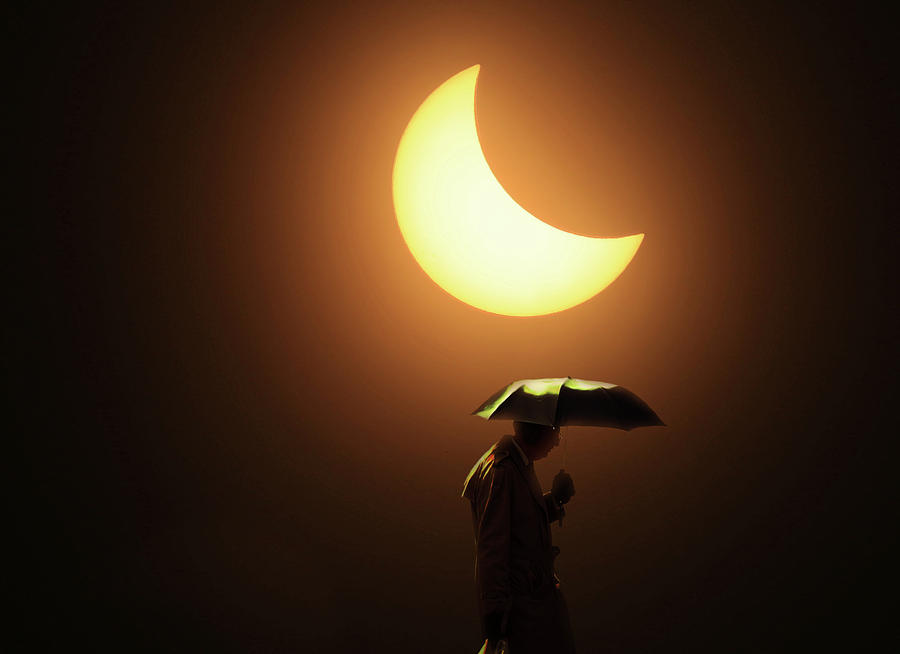 Umbrella Man Eclipse Photograph by Christopher McKenzie