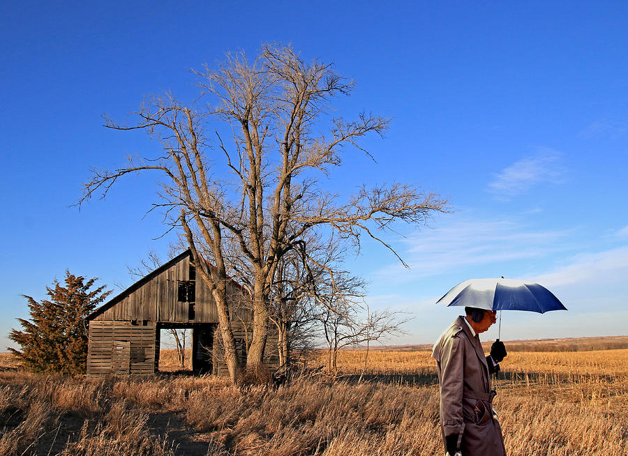Umbrella Man in Lower Nebraska Photograph by Christopher McKenzie