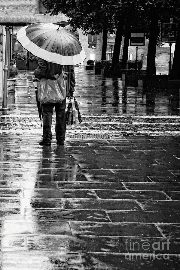 Black And White Photograph - Umbrella Salesman by HD Connelly
