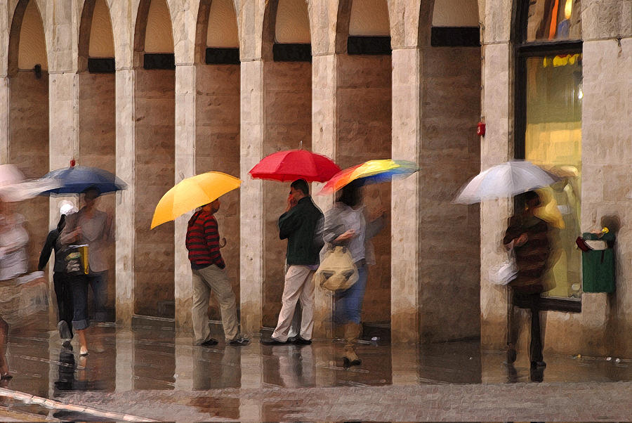 Umbrellas in the Rain Photograph by Don Wolf