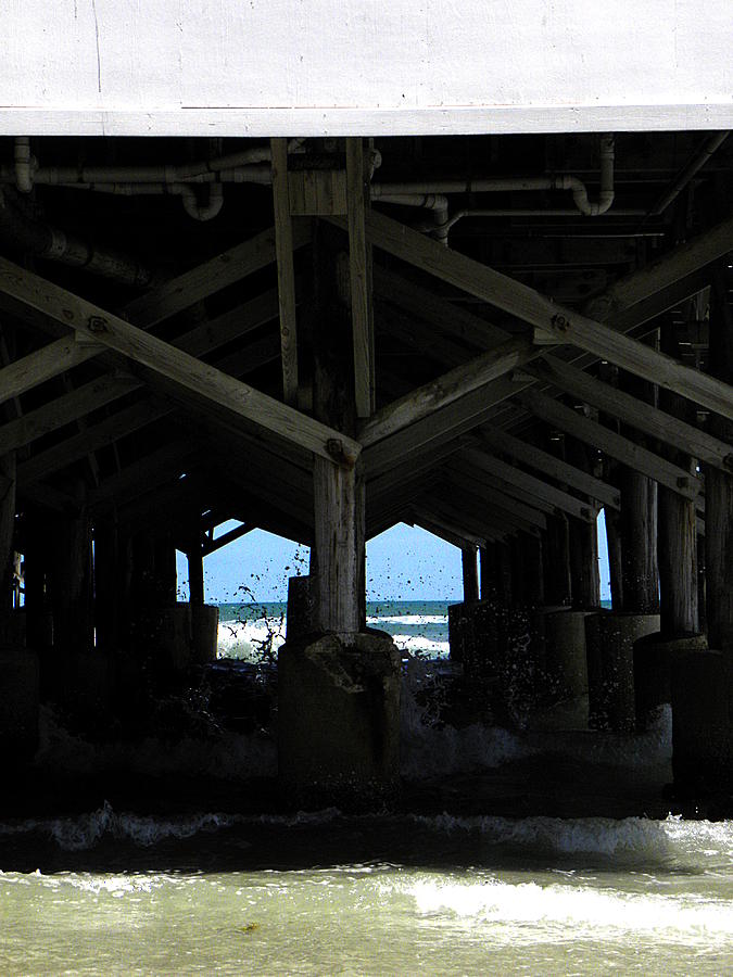 Under the Daytona Beach Pier 002 Photograph by Christopher Mercer