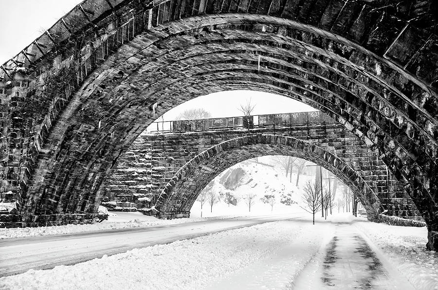 Under the East Falls Railroad Bridges in the Snow in Black and W Photograph by Bill Cannon