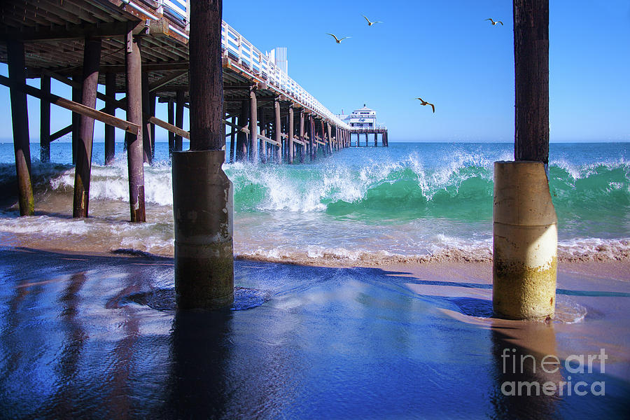 Under The Malibu Pier Photograph by Jerry Cowart