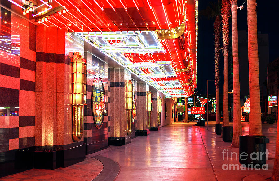 Under the Neon Lights on Fremont Street Photograph by John Rizzuto