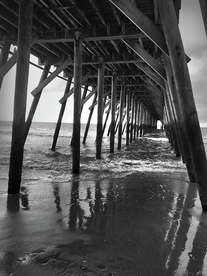 Under the Pier at Myrtle Beach Photograph by Kelly Hazel