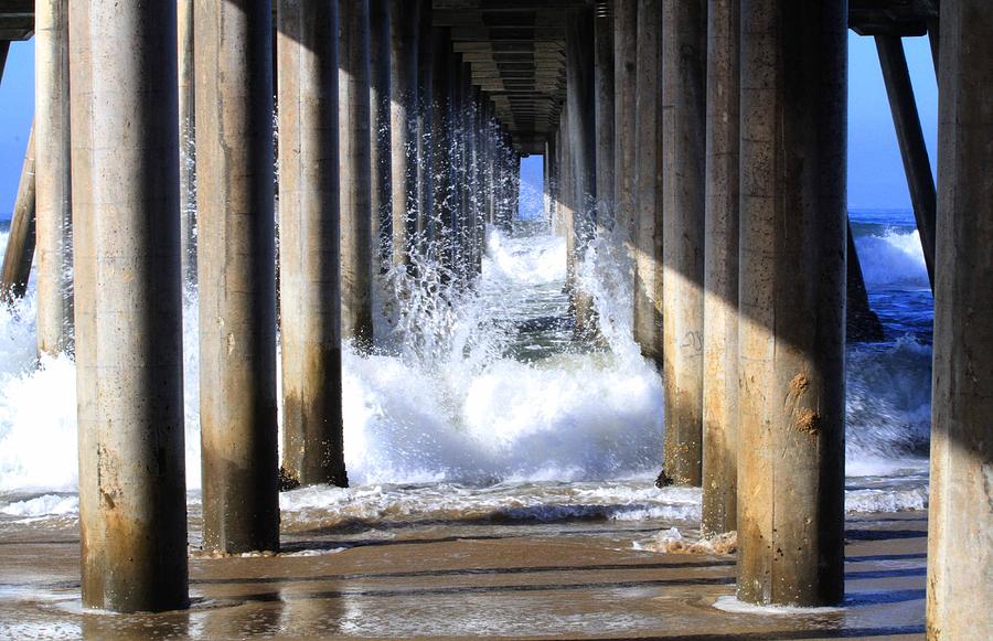 Under the pier Photograph by Karen Ruhl