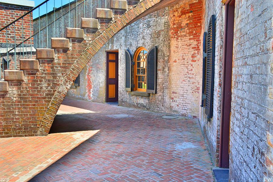 Under The Stairs At Fort Macon  Photograph by Lisa Wooten