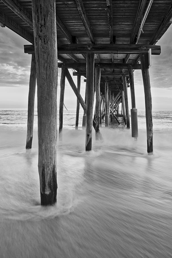 Underneath The Pier At The Jersey Shore  BW Photograph by Susan Candelario