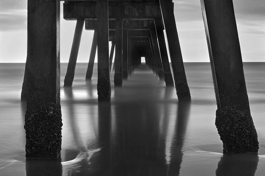 Underneath the Pier - Jacksonville Beach - Florida - Black and White Photograph by Jason Politte