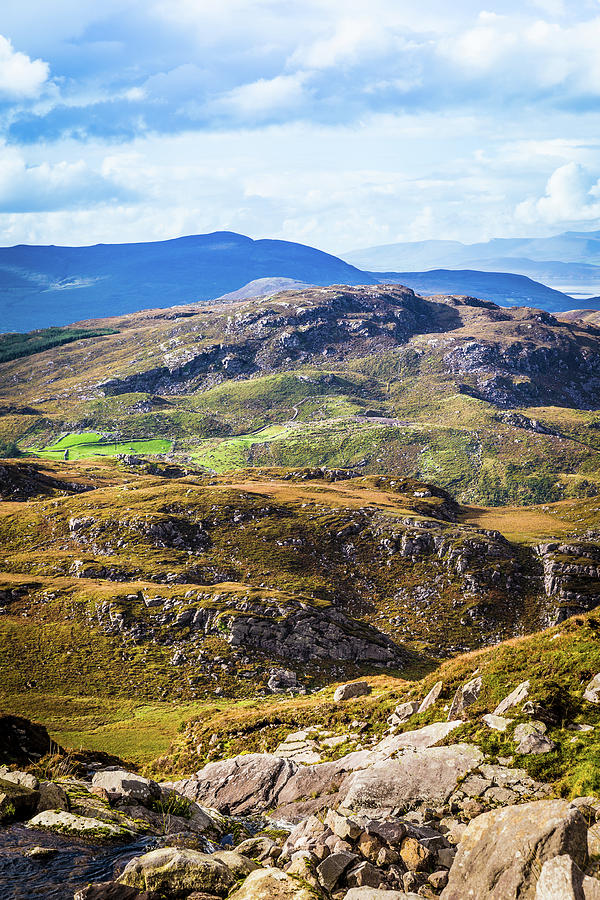 Undulating green, purple and yellow rocky landscape in  Ireland Photograph by Semmick Photo