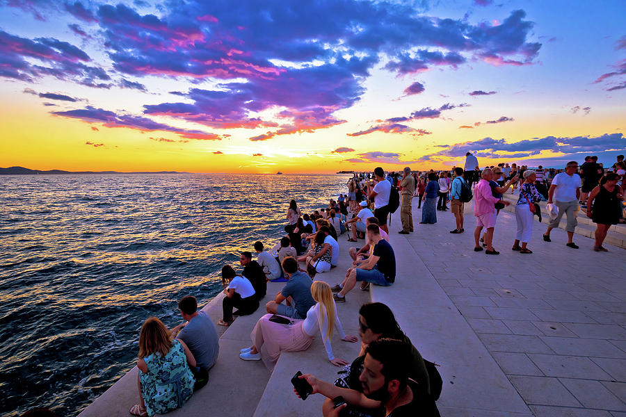 Unidentified people on Zadar sea organs Photograph by Brch Photography