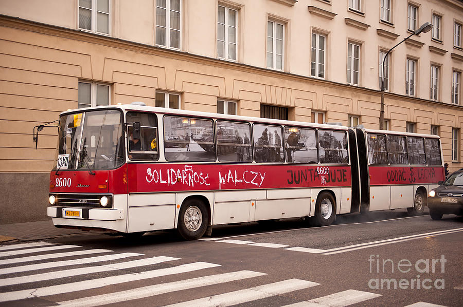 Unique Solidarnosc bus on street Photograph by Arletta Cwalina