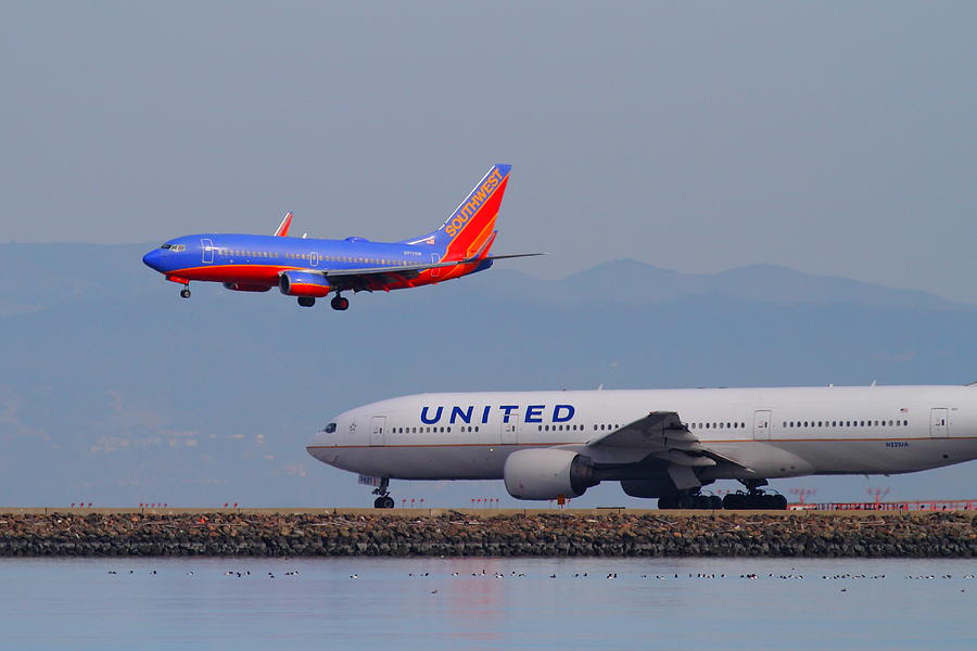 United Airlines And Southwest Airlines Jet Airplane At San Francisco International Airport SFO.12087 Photograph by Wingsdomain Art and Photography