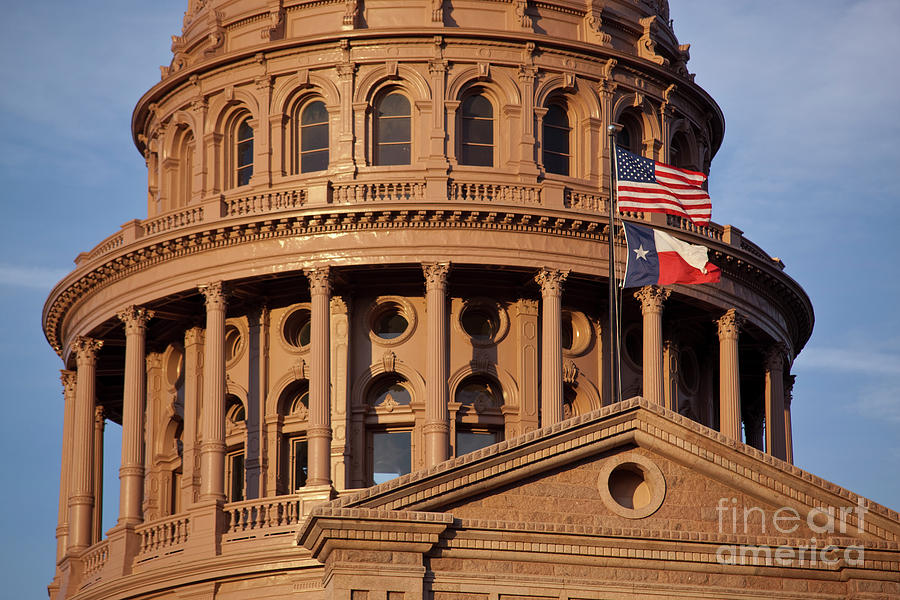 Dome Photograph - United States of America and Texas Flags fly over the majestic Texas State Capital Dome by Dan Herron
