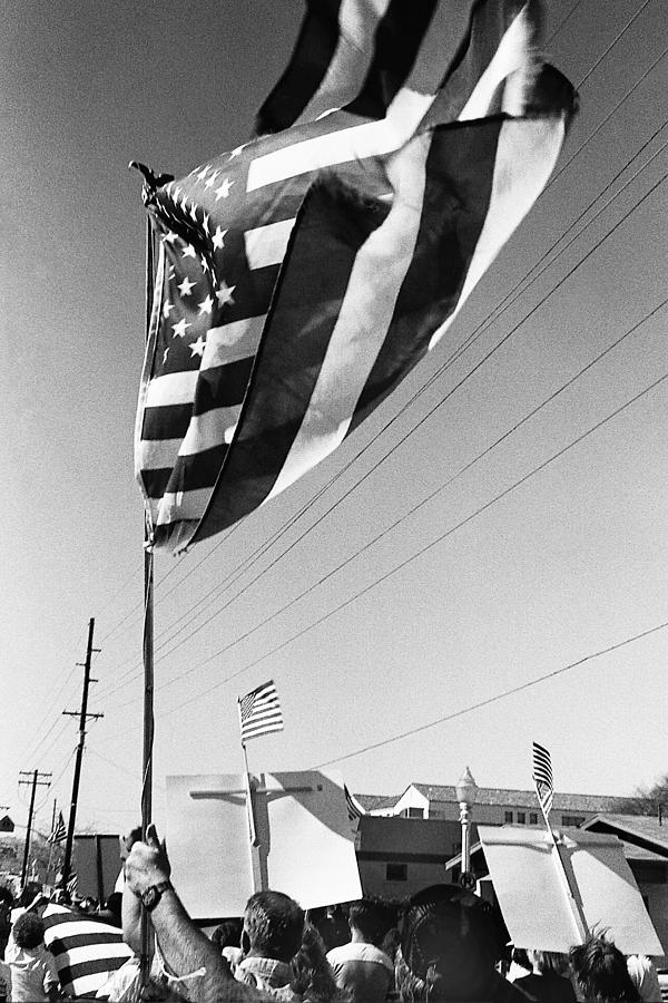 Upraised flag support MLK day march Tucson Arizona 1991 Photograph by David Lee Guss
