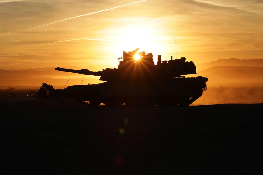 U.S. Army Soldiers, maneuver their M1A2 Abrams tank to avoid indirect fire Painting by Celestial Images