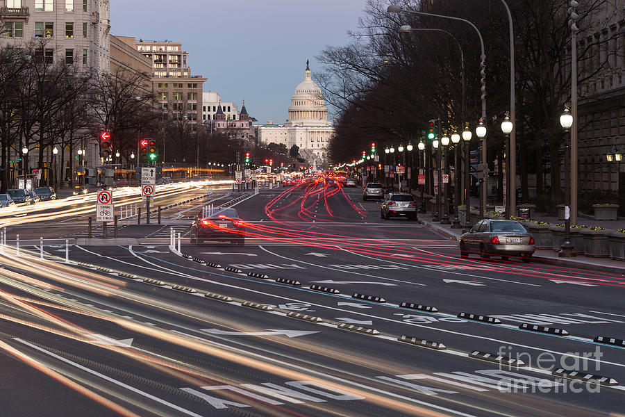 US Capitol Building and Pennsylvania Avenue Traffic II Photograph by Clarence Holmes