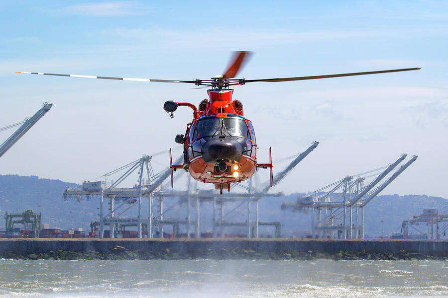 USCG MH-65 Dolphin in Low Hover Photograph by Rick Pisio
