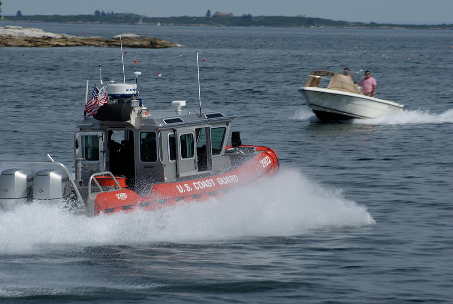 USCG on a mission Photograph by Lois Lepisto