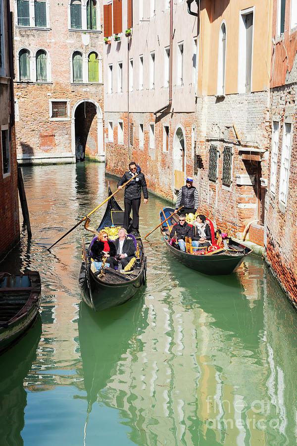 v Venetian gondola in canal Photograph by Anastasy Yarmolovich