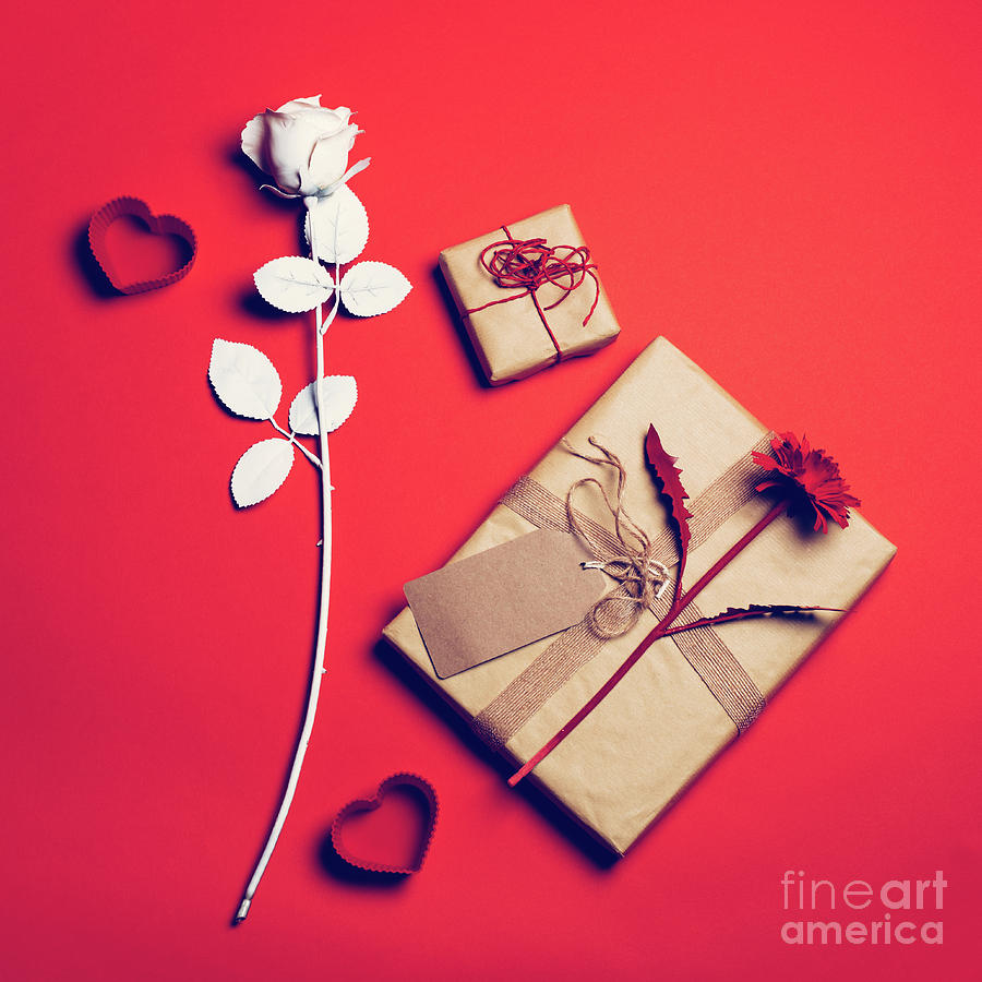 Valentine composition with flowers and gifts. Photograph by Michal Bednarek