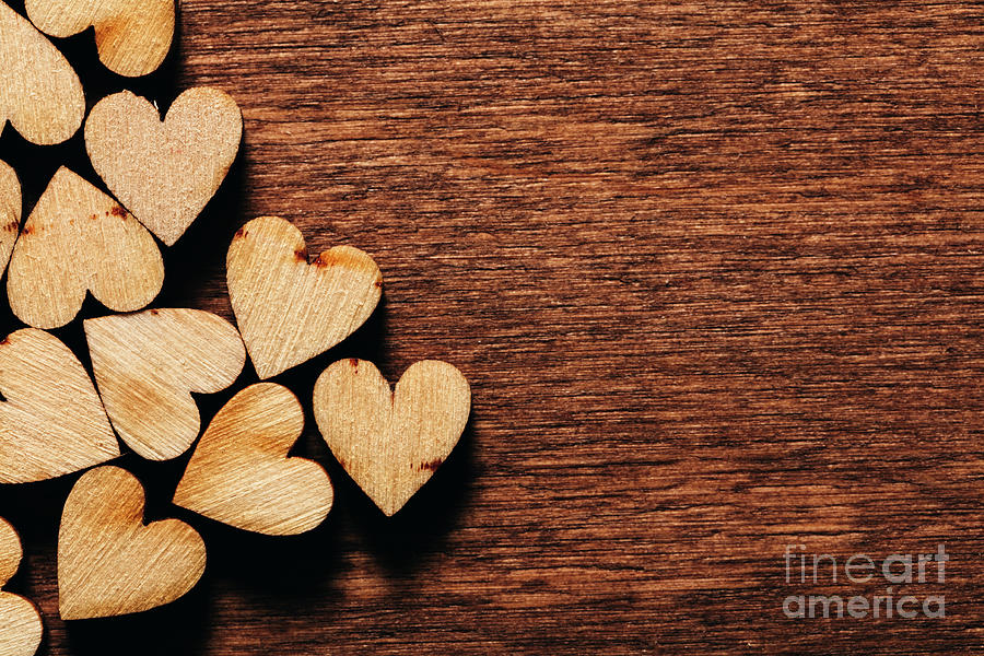 Valentines Day Photograph - Valentines Day background. Wooden hearts. by Michal Bednarek