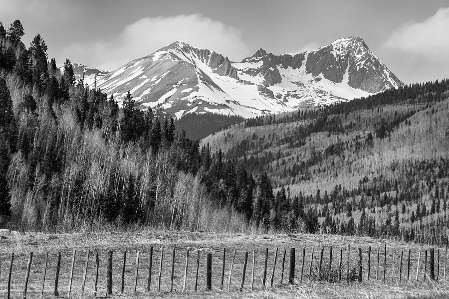 Valley And Rocky Mountains In Black And White Photograph