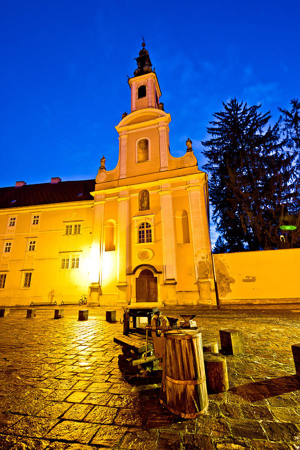 Varazdin old street and church evening view Photograph by Brch Photography